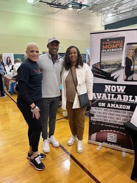 Book signing for A Football Mom's Playbook at a school book fair