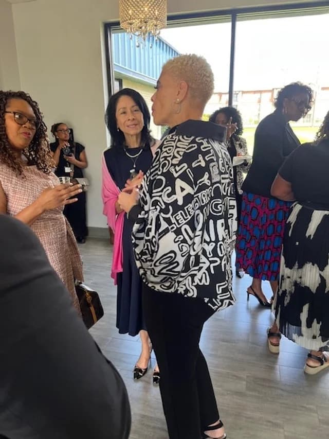 Dr. Sneed in fellowship at a community gathering
