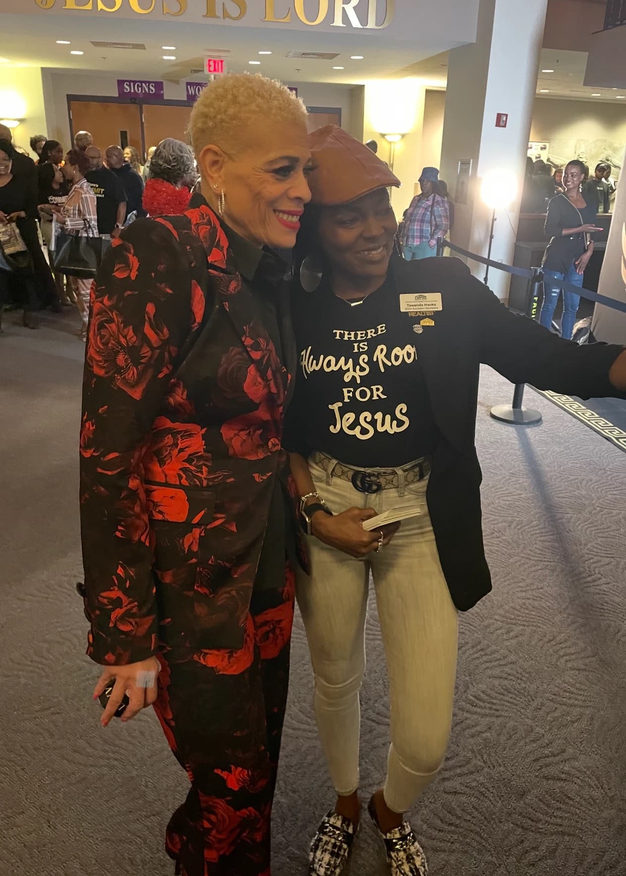 Dr. Sneed embracing a member at New Birth