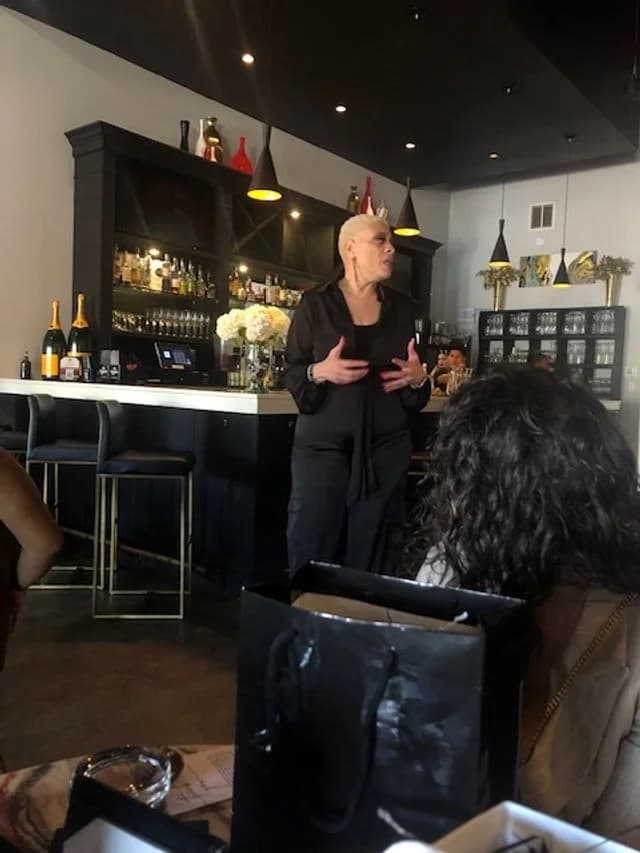Dr. Sneed speaking to an intimate gathering