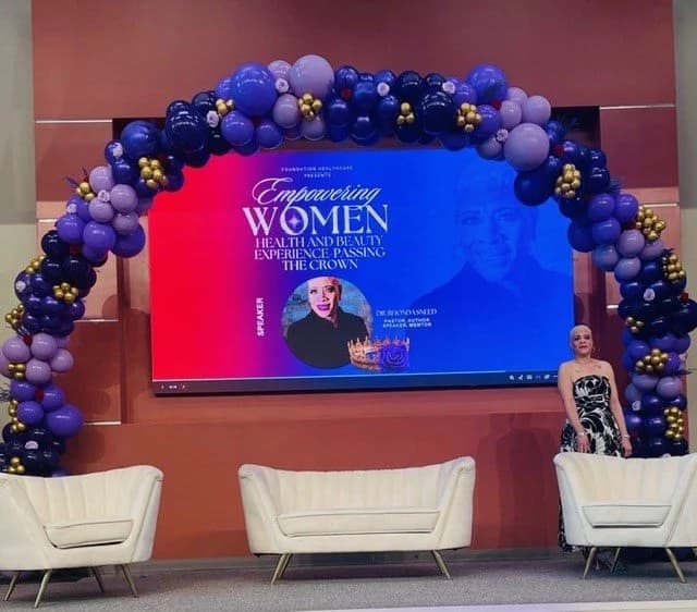 Dr. Rhonda Sneed on stage at the Empowering Women Health and Beauty Experience