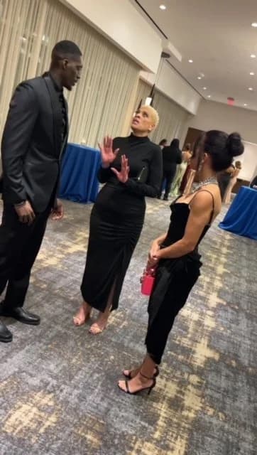 Dr. Rhonda Sneed ministering one-on-one at an event